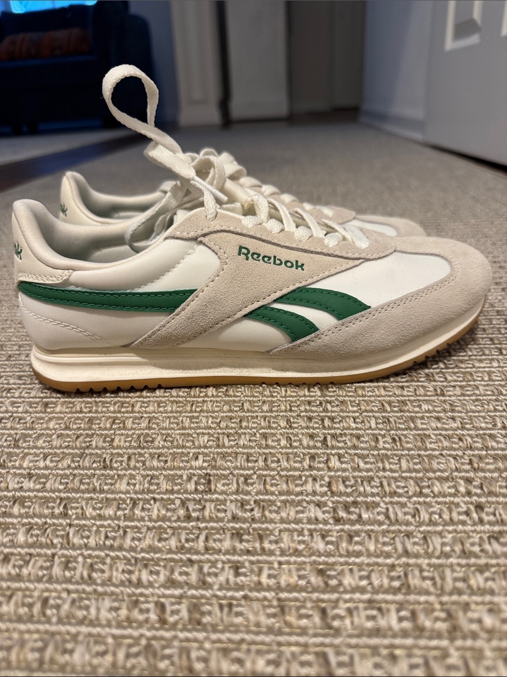 Reebok Women’s White Sneakers with Green Logo Stripes